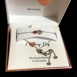 I love my dog bracelet. It is sterling silver still in the original box.